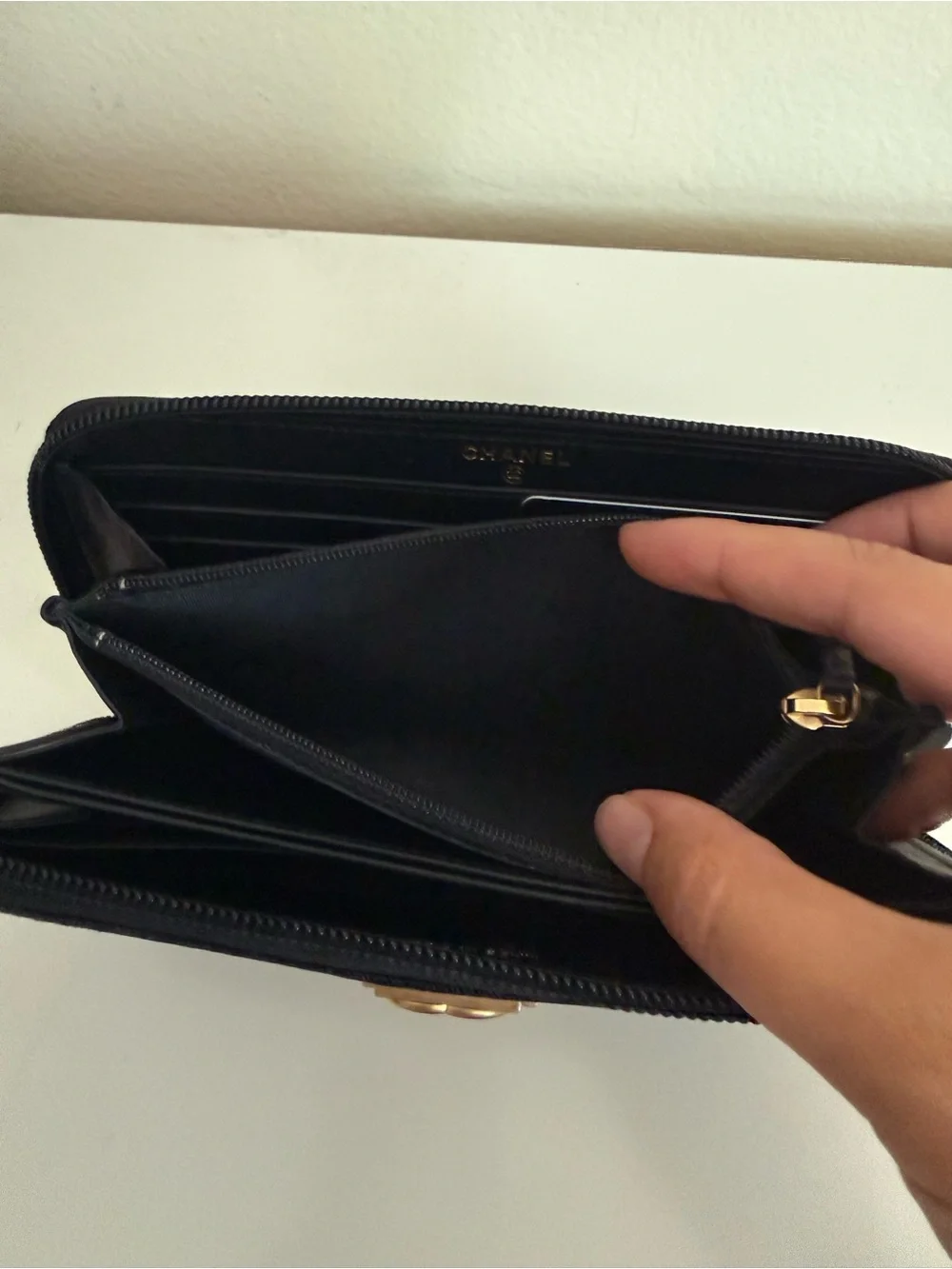 CHANEL Black Quilted Zip-Around Wallet with Gold CC Lock